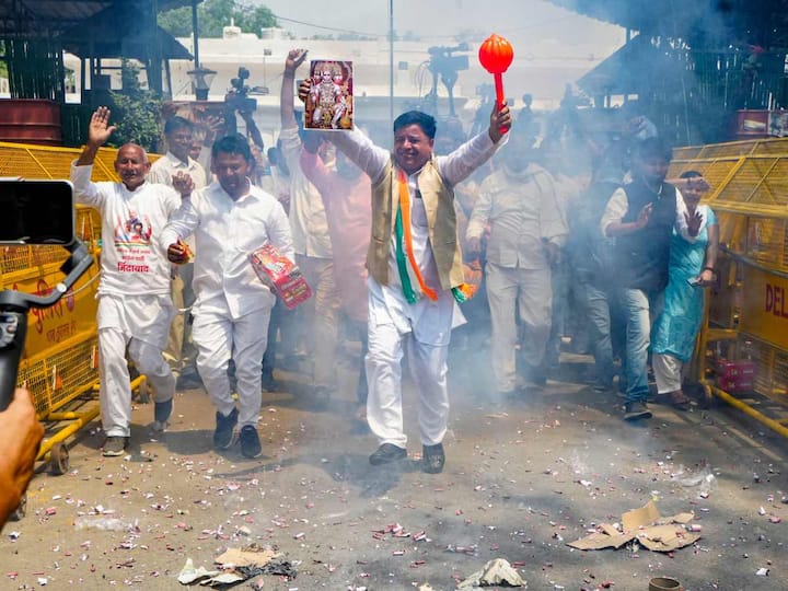 Celebrations broke out at AICC headquarters in New Delhi and other places across India after the Congress won in Karnataka Assembly Elections on Saturday. (Source: PTI)