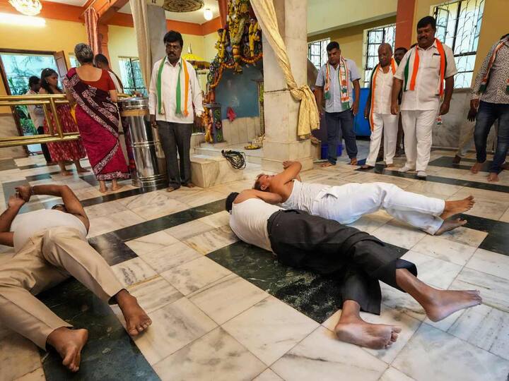 Congress workers were also seen performing 'Urulu Seve' at Bhagawan Sree Maruthi Temple to celebrate the party's win in the Karnataka Assembly elections on May 14. (Source: PTI)