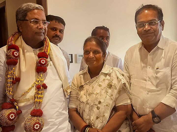 Independent candidate from Harapanahalli assembly constituency, Latha Mallikarjun met former Karnataka CM Siddaramaiah after her victory in the Karnataka Assembly elections in Bengaluru on Sunday. (Source: PTI)