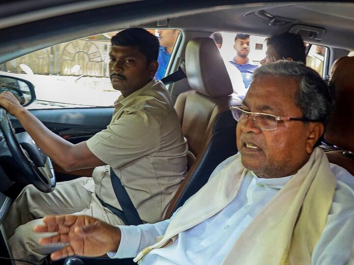 Congress leader Siddaramaiah, another contender for the chair of the Chief Minister, left his residence in Delhi for Kharge's residence to attend the High Command meeting alongside Shivakumar. (Image Source: PTI)