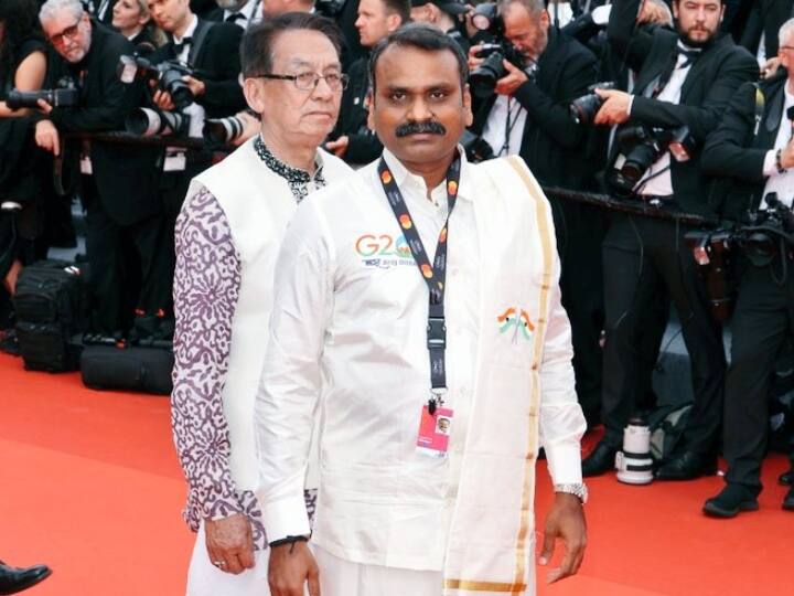 Union minister L Murugan walked the red carpet at Cannes Film Festival wearing Tamil styled veshti shirt Cannes Film Festival: कान्स फिल्म फेस्टिवल में केंद्रीय मंत्री ने 'वेशती-शर्ट' में बिखेरा जलवा, तिरंगे के साथ दिखा G20 का लोगो