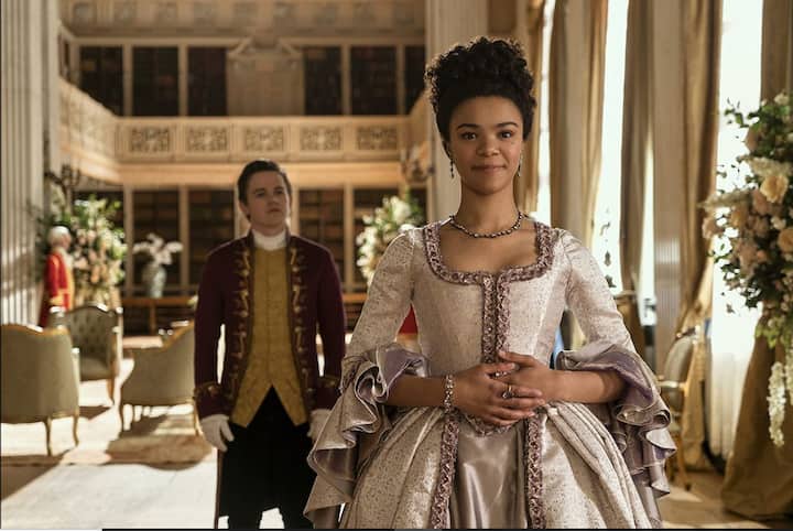 India Ria Amarteifio's performance as Queen Charlotte is another commendable feather in the series hat. Her dilemma to serve her nation, do her duty as a monarch besides also finding love in a tumultous partner is an idealistic notion--nevertheless, a new perspective on portrayal of love and a reversal of the entire 'madwoman in the attic' idea