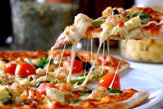 Pizza Health Risk: શું તમે દર અઠવાડિયે ખાઓ છો પિઝા? જાણો તમારા શરીર પર શું થાય છે અસર?