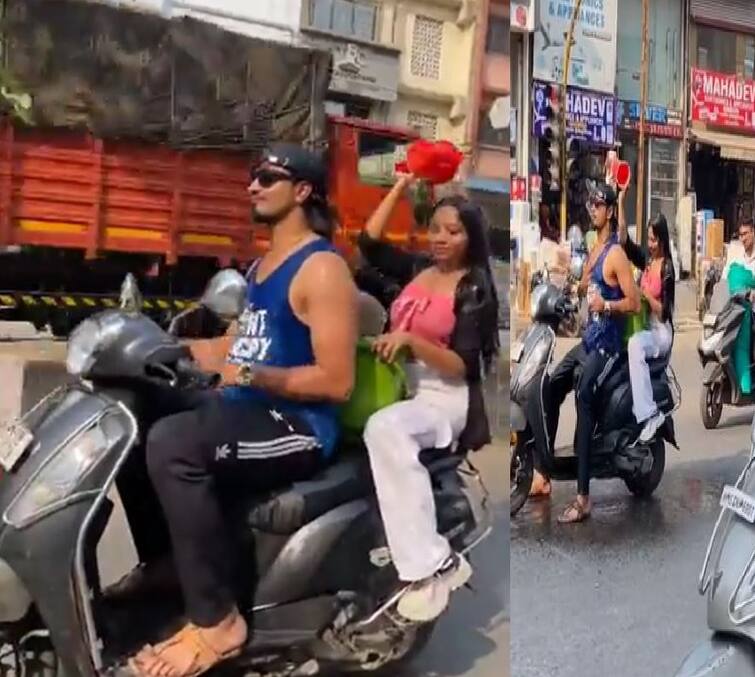 If they could not bear the heat, young men and women started bathing on scooters in Bhar Bazar, the video went viral Viral Video: ગરમી સહન ન કરી શક્યા તો ભર બજારે સ્કૂટી પર ન્હાવા લાગ્યા યુવક-યુવતિ, વીડિયો થયો વાયરલ