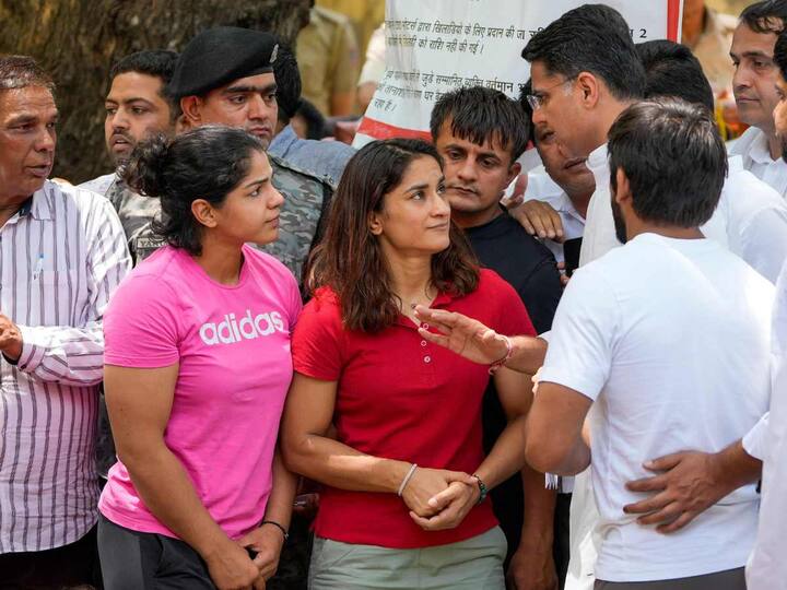 Congress leader Sachin Pilot arrived at Jantar Mantar in the morning and met Olympic medallists Bajrang Punia and Sakshi Malik and Asian Games gold medallist Vinesh Phogat. (Source: PTI)
