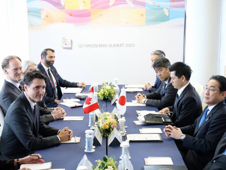 Canadian Prime Minister Justin Trudeau and Japanese Prime Minister Fumio Kishida talk during their bilateral meeting on the sidelines of the G7 Summit on May 19, 2023, in Hiroshima, Japan. (Image Source: Getty)