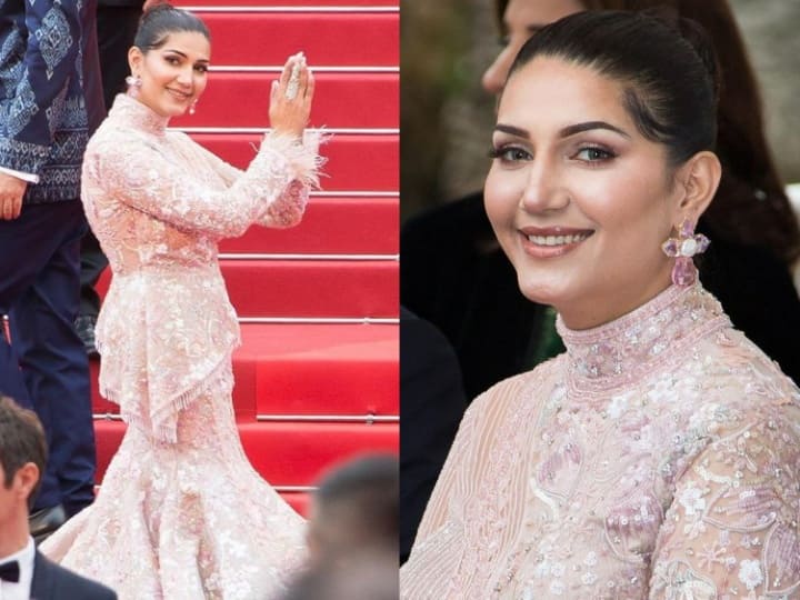 Cannes 2023 में इस साल कई बॉलीवुड हसीनाओं के साथ हरियाणा की डांसिंग क्वीन सपना चौधरी ने भी डेब्यू किया है. एक्ट्रेस ने अपने रेड कार्पेट लुक की कुछ शानदार तस्वीरें अब फैंस के साथ शेयर की हैं.