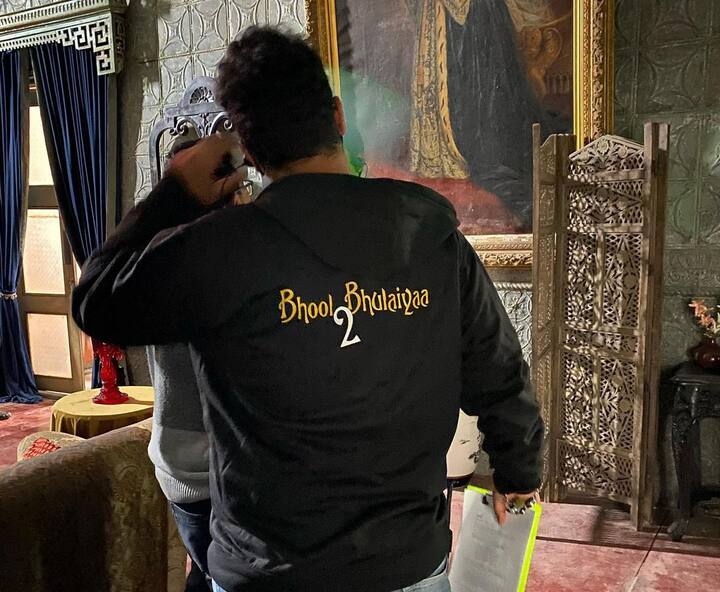 And another candid featuring a crew member wearing a Bhool Bhulaiyaa 2 hoodie