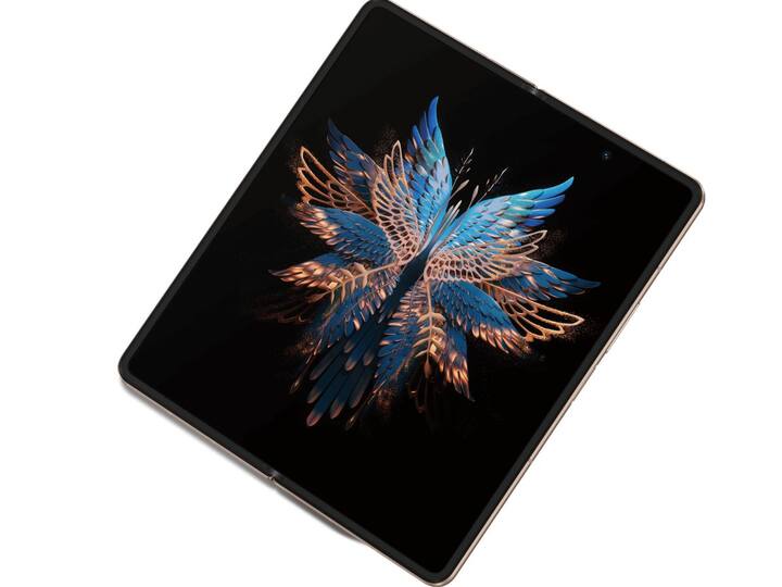 Tecno Phantom V Fold - (Price: Rs 88,888) - features a 6.42-inch LTPO AMOLED cover display, 7.85-inch main display, MediaTek Dimensity 9000+ processor, 12GB RAM, and a triple camera setup. With its impressive specifications, the V Fold has the potential to gain popularity in the Indian market. (Image: Tecno Phantom)