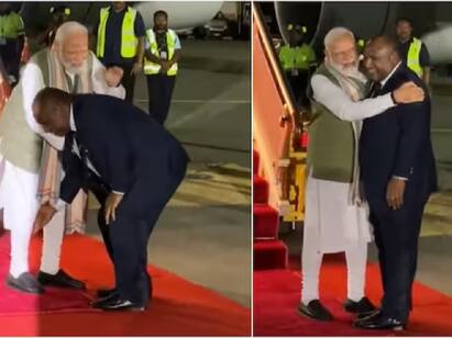 Papua New Guinea PM Shares A Hug Then Touches PM Modis Feet viral video Watch Video: மோடியின் காலில் விழுந்த பப்புவா நியூ கினியா பிரதமர்...! என்ன காரணம் தெரியுமா..?