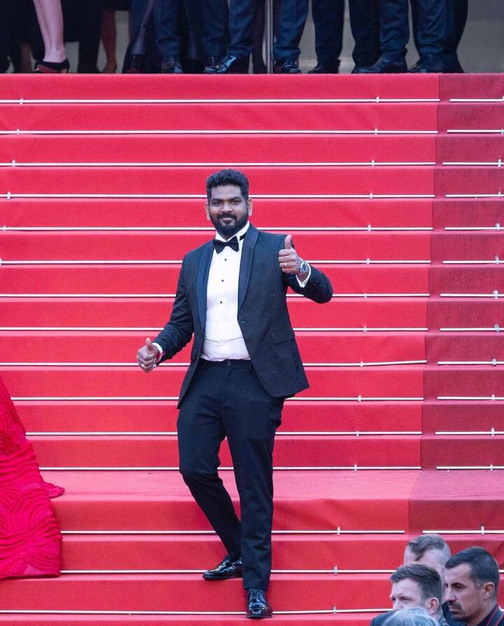 ஸ்டைலா கெத்தா கருப்பு கோட்டு சூட்டில் கேன்ஸ் திரைப்பட விழாவில் கலந்து கொண்டுள்ளார் விக்னேஷ் சிவன்