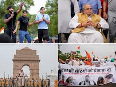 In Pics: Wrestler's Take Out Candlelight March Against WFI Chief At India Gate, Satyapal Malik Joins Protest