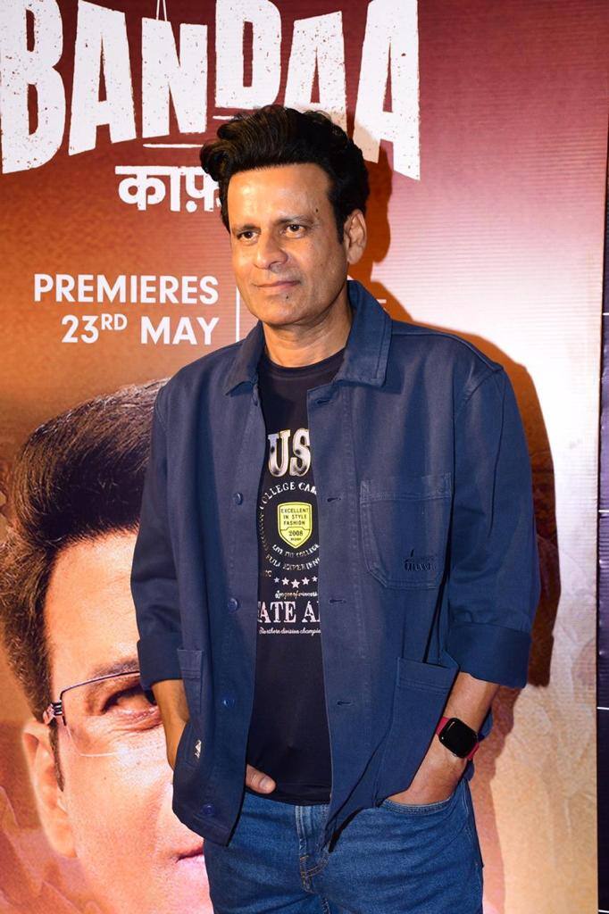 Manoj Bajpayee, who plays the protagonist in the film, looked dapper in a black graphic printed t-shirt paired with a navy blue shirt and dark blue denims.