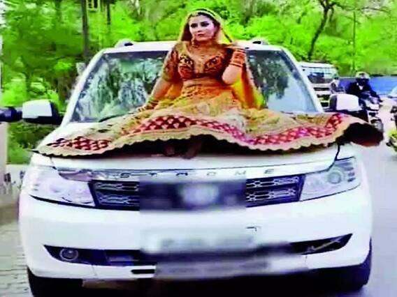 Challan : Trafic Challan Issued While Brie Sitting on Car Bonnet Challan : દુલ્હા-દુલ્હન બની કાર પર વટ પાડનારાઓ સાવધાન! થશે આકરો દંડ