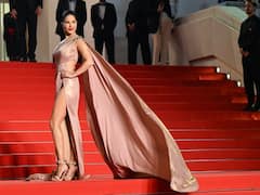Sunny Leone Exudes Elegance In Satin Gown At Cannes