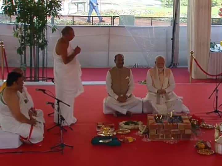 Prime Minister Narendra Modi inaugurated the new Parliament building on Sunday. The ceremony started with a Havan which the Prime Minister attended alongside Lok Sabha Speaker Om Birla. During the Havan, the 'Sengol' was consecrated amid Vedic chanting by Adheenams before its installation. (Image Source: Twitter/@ANI)