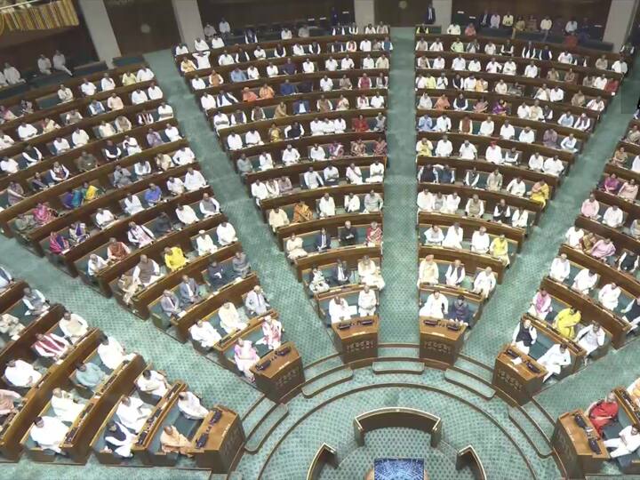 An aerial view of the new Lok Sabha as people got seated in the house. (Image Source: Twitter/@ANI)