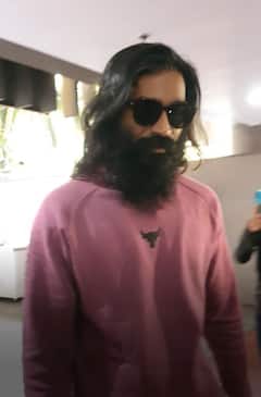 Dhanush Looks Unrecognisable At Airport, Fans Call Him 'Baba Ramdev Pro' - See Pics