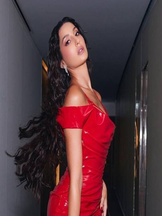 Nora Fatehi Slips Into A Stunning Red Latex Gown