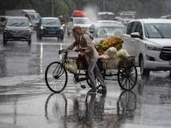 PHOTOS: दिल्ली में इस बार मई का महीना रहा सबसे ठंडा, टूटा 36 साल का रिकॉर्ड