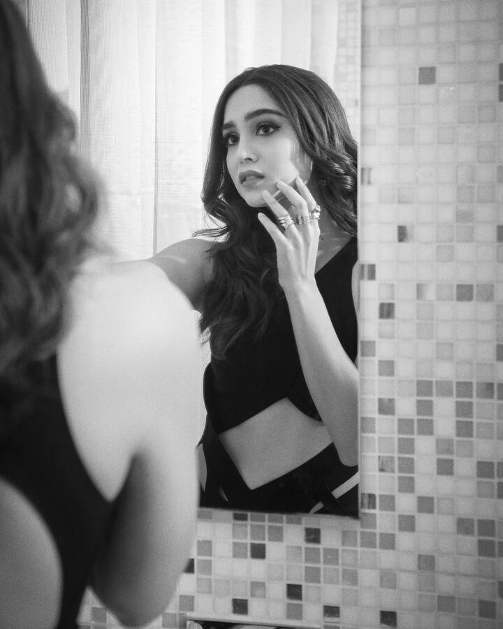 She wore a one-shoulder dress with corset designs, cut-out elements, and a flowing train. (Image Source: Instagram/Sharvari)