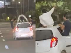 మద్యం మత్తులో కార్‌ రూఫ్‌పై పుషప్స్, హడలెత్తించిన మందు బాబులు - వైరల్ వీడియో