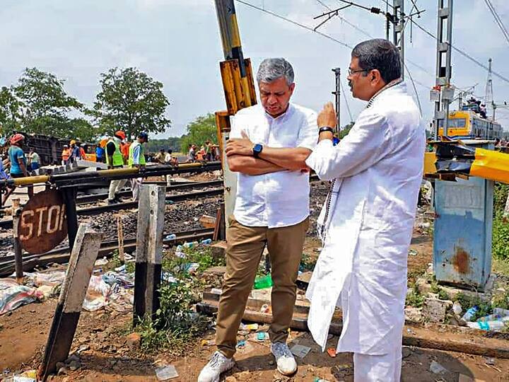 Railways Minister Ashwini Vaishnaw with Union Minister Dharmendra Pradhan oversees restoration work at the site of the accident that involved three trains, near Bahanaga Bazar railway station in Balasore district. (Image Source: Twitter/@dpradhanbjp)