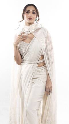 Malaika Arora डीप नेक व्हाइट ड्रेस में हुईं स्पॉट | ENT LIVE