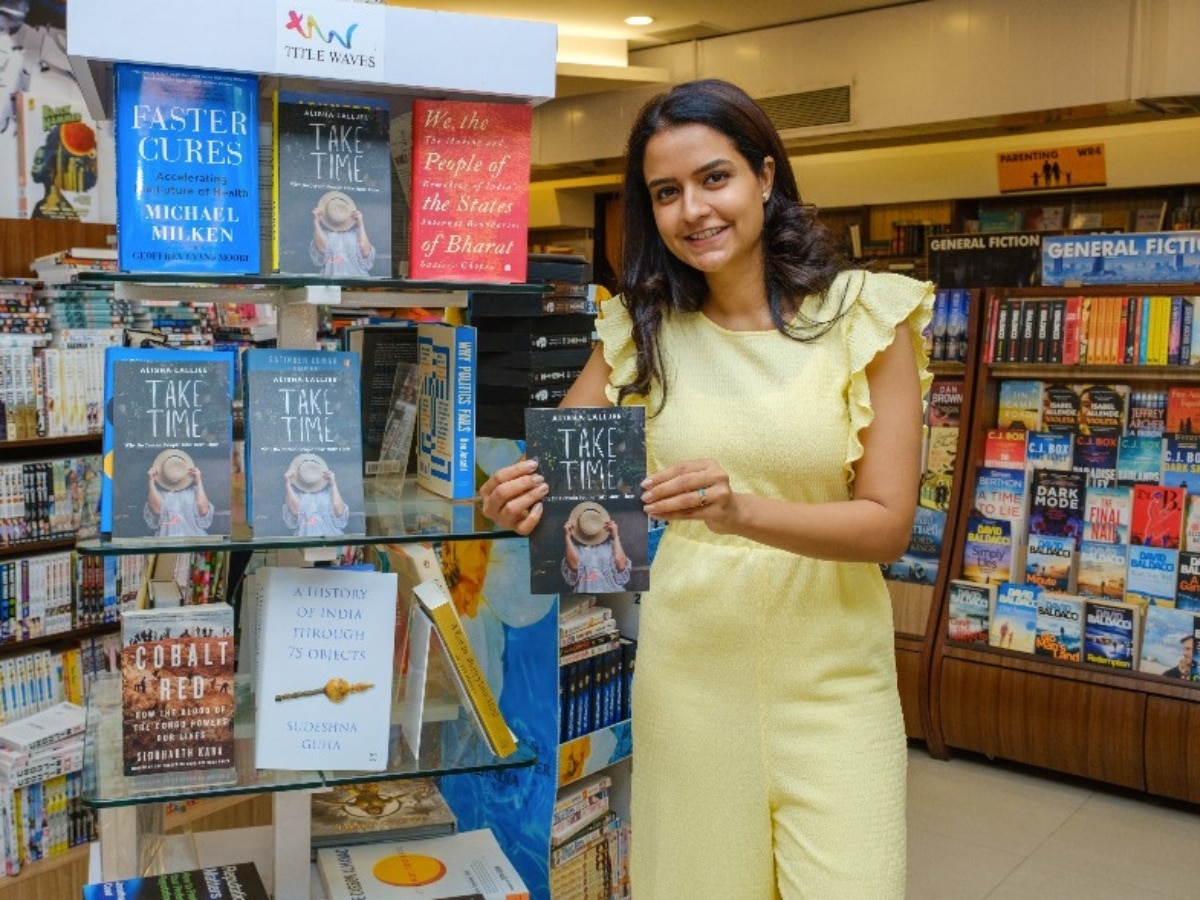 Mumbai-based psychologist Alisha Lalljee with a copy of her book 'Take Time'.