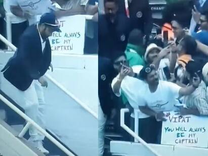 virat always be my captain rohit sharma in front of fans banner - in pics Viral Photo: ’என் கேப்டன் எப்போதும் கோலிதான்..’ ரோஹித் சர்மாவை பெவிலியனில் வெறுப்பேற்றிய ரசிகர்..!