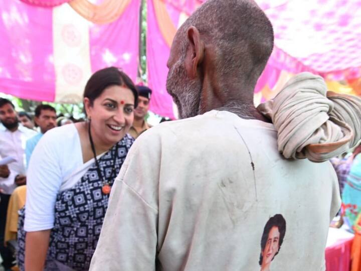 Smriti Irani meets man wearing T shirt with Priyanka Gandhi picture shares photo takes jibe Rahul Gandhi Smriti Irani: स्मृति ईरानी ने प्रियंका गांधी की तस्वीर छपी टीशर्ट पहने शख्स से की मुलाकात, फोटो शेयर कर राहुल गांधी पर कसा तंज