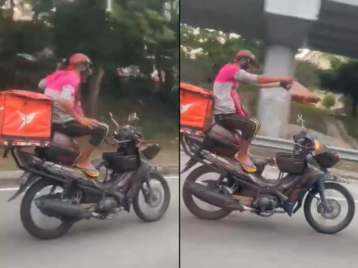 Malaysia Man Riding Bike Without Using Hands Police Arrested Video Viral शख्स ने बाइक पर किया जानलेवा 'स्टंट', फिर पुलिस ने जो किया वो मजेदार है! देखिए Video