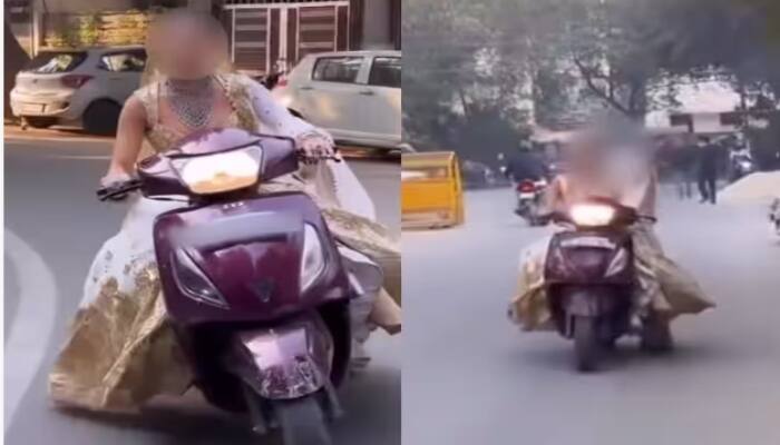 Bride Making Reels on busy Road delhi police issued Challan Video Viral ਸੜਕ 'ਤੇ ਰੀਲ ਬਣਾ ਰਹੀ ਸੀ ਲਾੜੀ , ਪੁਲਿਸ ਨੇ ਕੱਟਿਆ ਭਾਰੀ ਚਲਾਨ, ਕਿਹਾ- ਸੜਕ 'ਤੇ ਨਾ ਕਰੋ ਅਜਿਹੀਆਂ ਬੇਵਕੂਫੀਆਂ