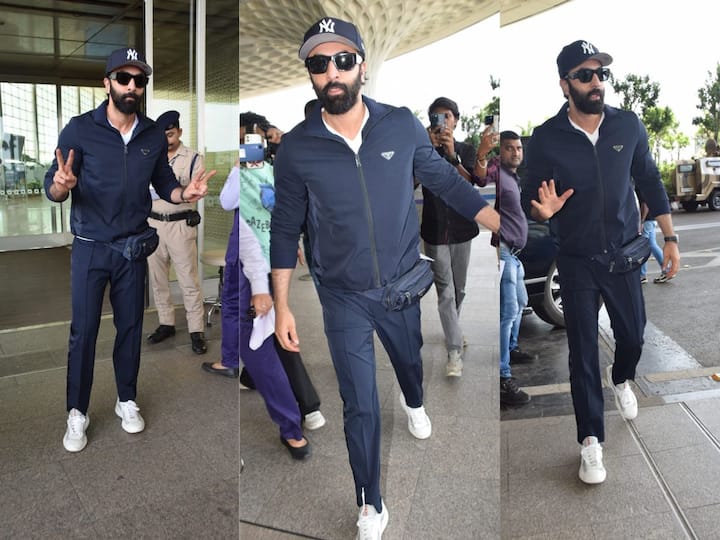 Ranbir Kapoor Airport: নীল কো-অর্ড সেট, কালো সানগ্লাস, মুখভর্তি দাড়ি নিয়ে বিমানবন্দরে পৌঁছন রণবীর কপূর। পোজ দিলেন পাপারাৎজিদের জন্যও।