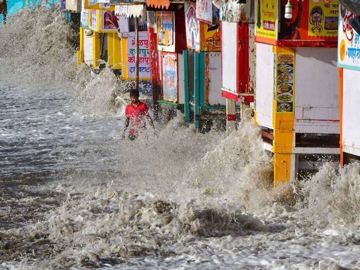 High tidal waves were witnessed at Marine Drive as cyclone Biporjoy intensified. The cyclone is likely to pass at a distance of 200-300 km from the Porbandar coast but will bring thunderstorms and strong wind in Gujarat in the next five days. (Source: PTI)
