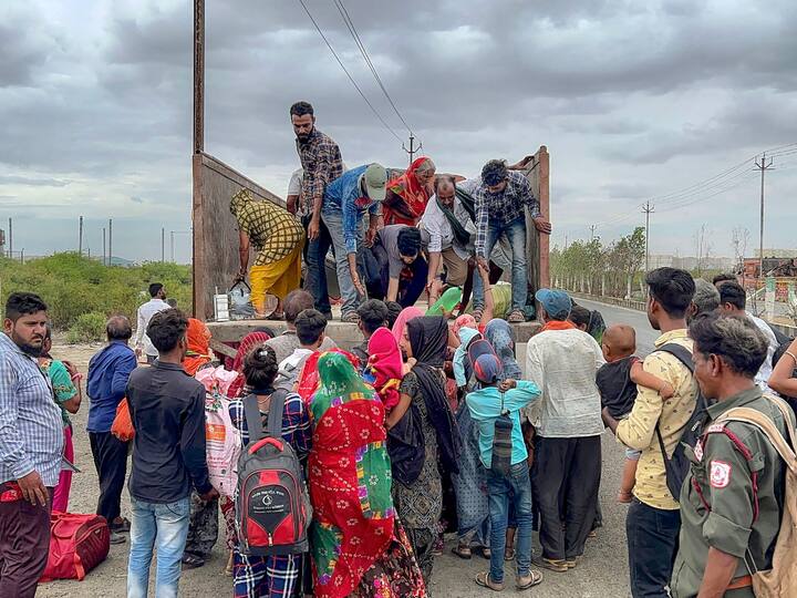 Villagers leave Jakhau village during evacuation ahead of cyclone Biparjoy's landfall, in Kutch district. (Photo: PTI)