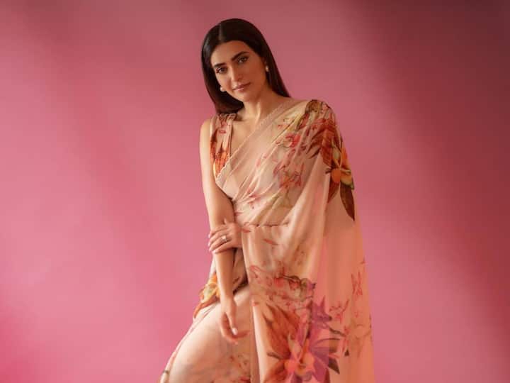 Karishma Tanna, most recently seen in the Netflix series Scoop, posed in a floral saree for a photoshoot. Karishma looked elegant in her saree. See pics