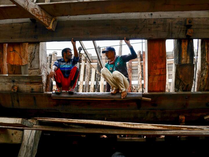 Precautionary measures being taken by workers at a ship manufacturing yard in the Kutch district. (Image Source: PTI)