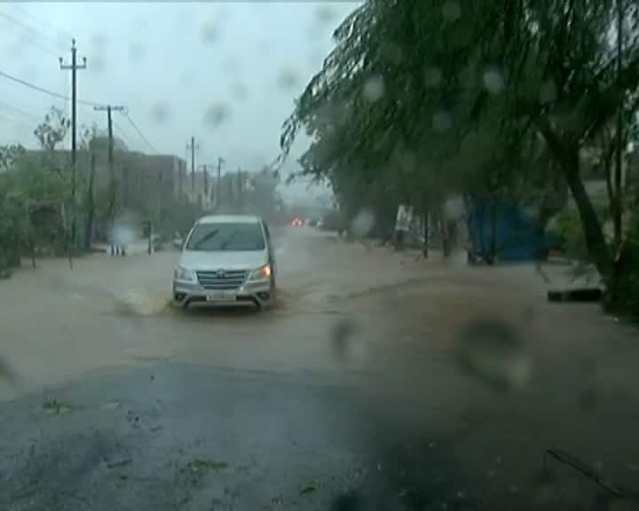 After Cyclone Biparjoy , most of the districts of Saurashtra and North Gujarat receives heavy rain with strong winds કચ્છમાં ભારે વરસાદથી તારાજી, માંડવી અને આસપાસના વિસ્તારમાં 12 થી 13 ઇંચ વરસાદ ખાબક્યો, રસ્તા પર પાણી ફરી વળ્યા