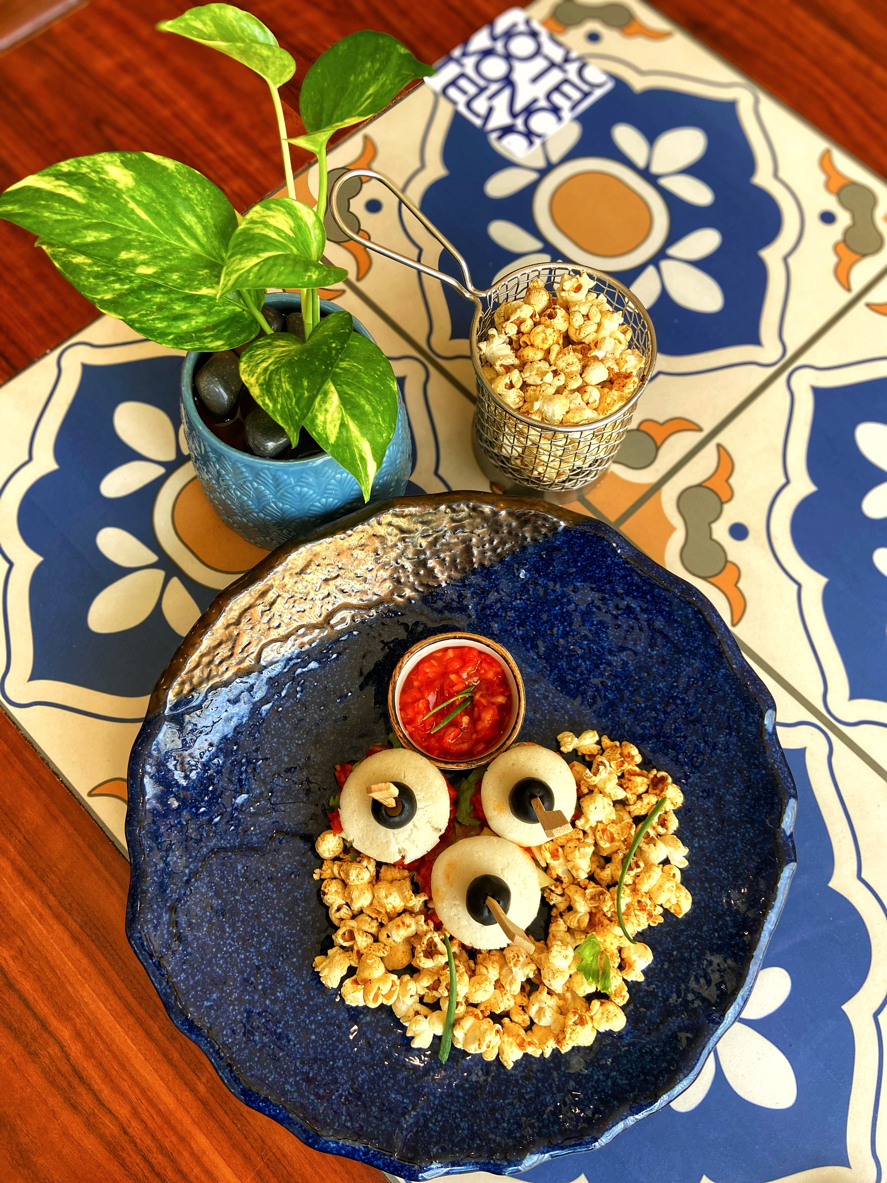 Mini Idli sandwiches with buttered Popcorn (Image Source: Novotel Goa Candolim)