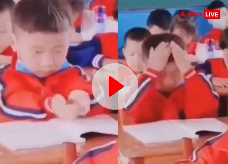 Funny Video: पढ़ाई करने का मस्त लॉजिक खोजा इस बच्चे ने, Video देख हंसते-हंसते हो जाएंगें लोटपोट Funny viral video on social media of child special way to study in class Funny Video: पढ़ाई करने का मस्त लॉजिक खोजा इस बच्चे ने, Video देख हंसते-हंसते हो जाएंगें लोटपोट