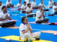 SEE PICS: Yoga Enthusiasts Bend And Stretch At Yoga Mahotsav Held In Delhi's Dhyan Chand Stadium