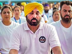 Bhagwant Mann, Raghav Chaddha Attend 'CM Di Yogshala' Event With 15,000 People In Jalandhar—See Pics