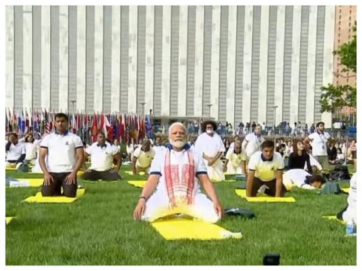 Prime Minister Narendra Modi, wearing a customised white yoga T-shirt and trousers, with an Assamese gamosa around his neck, started his address with a 'Namaste'.