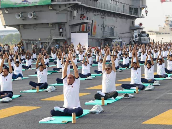 Defence Minister performs Yoga on board INS Vikrant in Kochi on 9th International Yoga Day.