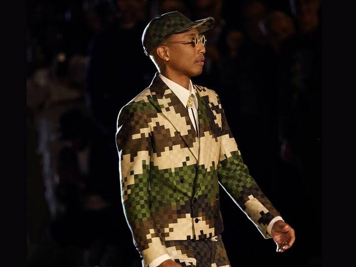 Pharrell Williams closed his debut show for Louis Vuitton in a digitalized Damoflage motif suit, paying tribute to Paris with the reinvigorated emblem of the Maison. (Image Source: Instagram/pharrell)