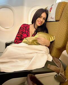 Neha Malik Photo: ફ્લાઈટમાં રેડ ડ્રેસમાં નેહા મલિકે આપ્યા કાતિલ પોઝ