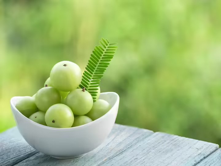 Premium Photo | Gooseberries ripe amla vitamin c wallpaper ai generated art