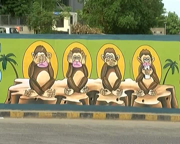 The painting of 4 monkeys of Makarba underpass created a controversy, know what is the case Ahmedabad News: મકરબા અંડરપાસના 4 વાનરની પેઇન્ટિંગે સર્જ્યો વિવાદ, જાણો શું છે મામલો