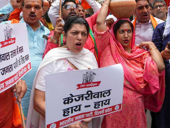 Delhi BJP leaders were also heard shouting several slogans during the protest against the AAP government over the issue of alleged water shortage in New Delhi on Saturday. (Source: PTI)
